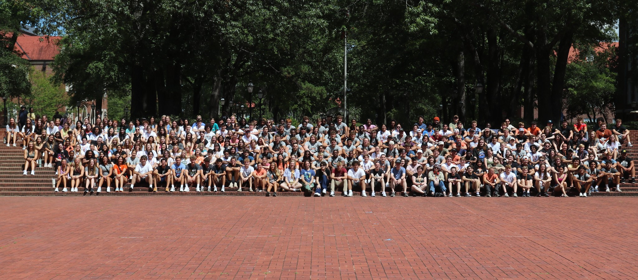 Photo of the Hendrix College Class of 2027 sitting on the steps of the Brick Pit. Photo taken Tuesday, August 15, 2023, Move-in Day.